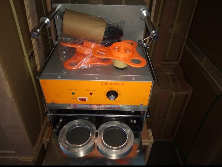 this automatic double cup sealer machine is suitable for sealing two glasses or cups at a time and suitable for packing plastic glasses and paper glasses