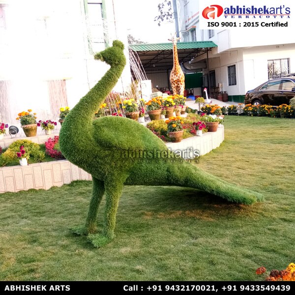Artificial grass peacock statue