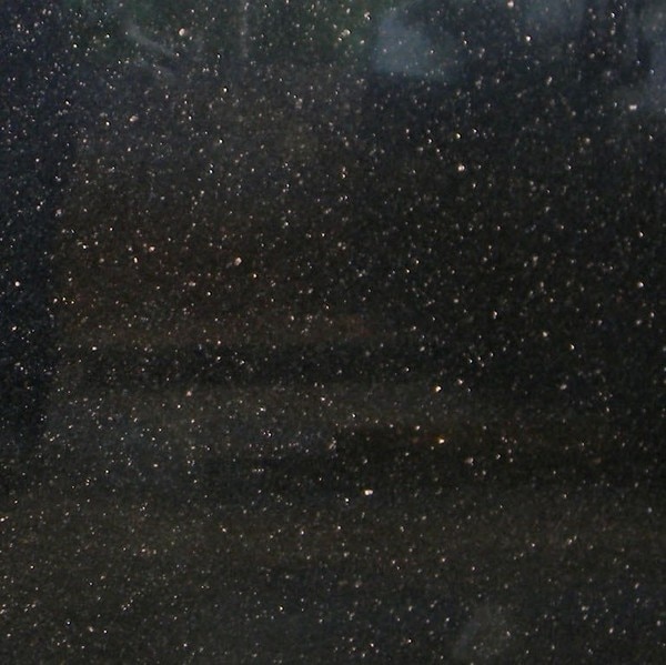 Black Galaxy Granite has been one of the most exported granite's from India both in terms of finished goods or raw blocks. It has gained popularity across the globe leaving no country of the world untouched with its magic. This type of granite with golden stars type sparkles in dark black base is only mined from India. Nature: GraniteOrigin: Near Ongole in Andhra Prades, IndiaColor and Texture: Golden Dots with dark black base.Availability: Slabs, Tiles & BlocksFinished: Polished, Leather, Lapatro etc.Sizes: As per order