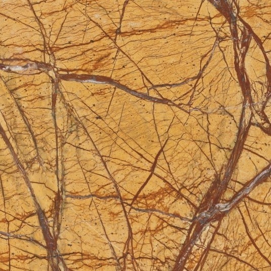 Rainforest Gold Marble or popularly known as Bidasar Gold Marble has taken a niche space across warehouses and across globe. This Marble has a very typical texture and looks exceptionally great in one's eye. This is available both in Polished as well as Brushed finish and also both in 2 cm as well as 3 cm thickness. This Marble is in demand both in domestic as well as international markets including Europe, Middle East Markets as well as US. Details as below: Nature: Marble Origin: Churu, IndiaColor and Texture: Gold color Base with dark brown as well as green lines moving across pattern. Availability: Slabs, Tiles & BlocksFinished: Polished & BrushedSizes: As per order