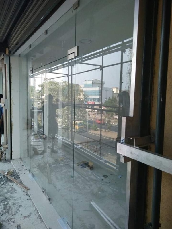 12mm toughened glass partition work and toughened glass door and commercial glass office glass door partition