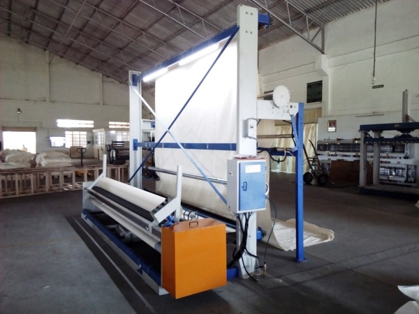 Product DescriptionWith the support of a team of engineers and production specialists we have emerged as a trusted manufacturer, supplier and exporter of premium quality Mini Fabric Rolling Machine. The machine is used for rolling fabrics at a medium scale in textile production units. We have used impeccable grade raw materials and parts for ensuring sturdy and durable rolling machines. Mini Fabric Rolling Machine is made to pass through stringent quality tests to ensure compliance with national and international quality standards. The range is extensively used in textile industry and can be purchased at low prices in comparison to the market.Features:    Superlative quality    Impeccable finishing    Cost-effective    Long lasting