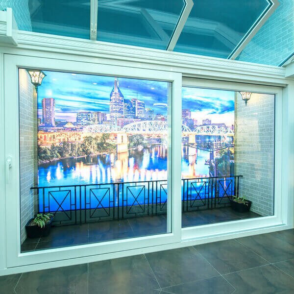 Doors can be much more than mere entry and exit points to your house. A testament to that fact can be found in the designs of our lift and slide doors. The lift and slide doors by Fenesta provide homes with easier accessibility for all people and offer a much sleeker appearance, which in turn enhances the aesthetic appeal and beauty of the façade of your home. Choosing a lift & slide door design that you feel would fit your home perfectly, from our range of uPVC lift and slide doors is a nifty way incorporating a chic and stylish element to your home.Lift and Slide doors have a unique construction owing to their lift mechanism. This lift mechanism functions by unlocking the knob and lifting the door off its seal to push or pull it almost effortlessly, as you see fit. Besides the ease of opening lift and slide patio doors, the locking mechanism is equally effortless; you only need to push it shut.FEATURES & BENEFITSThe uPVC lift and slide doors offer the perfect blend of form and functionFenesta offers modern and stylish designs at great prices for lift and slide doorsThe manufacturing process for lift and slide doors at Fenesta ensures dependabilitySuperior construction, excellent durability, and chic designsThe lift and slide doors also ensure enhanced securityConstructed with top grade materials that justify the cost of lift and slide doors by FenestaEnhanced sound insulation offered by Fenesta’s lift and slide patio doors does not cost extra yet helps create a better ambience inside your house.WHY CHOOSE UPVC LIFT AND SLIDE DOORS?When you shop for lift and slide doors with Fenesta, you shop for nothing less than the best. One of the immediate benefits of the lift and slide door installation that you will observe is the unequivocal ease of opening and closing the doors. What’s more, lift and slide glass doors by Fenesta bring in a voguish charm to your house and are some of the best lift and slide doors available in the Indian fenestration market. Quality designs are complemented by superior construction practices courtesy of fenestration experts and the best of manufacturing equipment at Fenesta. As the leading lift and slide door manufacturers in the country, we make sure to offer unmatched durability for our lift and slide doors in India while also being cost-effective.Another aspect that our doors excel at, apart from superior construction, excellent durability, and chic designs, is security. Owing to the exceptional construction and use of the best materials, doors by Fenesta offer an enhanced security aspect, which makes the cost of the lift and slide doors completely worth the expense. All lift and slide door designs by Fenesta also ensure ultimate sound proofing creating a comfortable ambience inside the home.