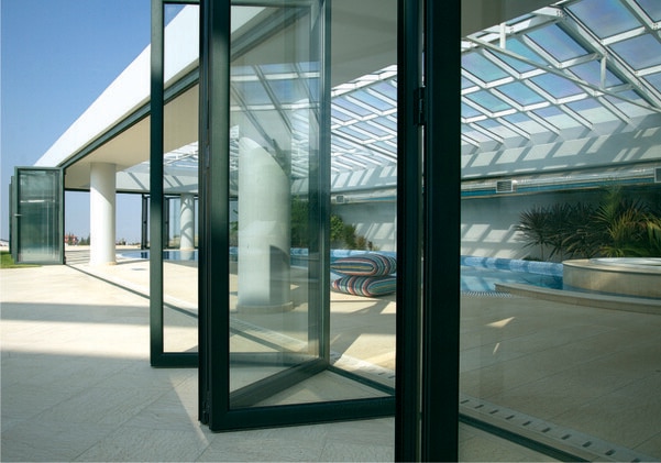 Thermal Break Slide and Fold Aluminium Door by Fenesta can open partially for easy access or wall to wall for an unobstructed view. These doors are energy efficient, built to last, and provide better ventilation along with enhanced heat insulation to keep the temperature cool inside. Seamlessly blending into your home-s interiors and exteriors, Fenesta-s thermal break slide and fold doors will change the way you see doors. The innovative range of thermal break aluminium doors by Fenesta has superior heat insulation as the door profile includes an extra layer of Nylon: Polyamide.FEATURES & BENEFITS125kg weight carrying capacity per sash, allows higher glass weight & SizeSubmerged threshold: easy accessibility of wheelchairContinuous barrier between the window frames prevents conductive thermal energy lossEnsures higher sound insulation when closedMulti-point locking systems and high-security hingesThermal break slide and fold doors offer complete access to the outdoorsOffers high functional flexibility as well as aesthetically pleasing form factor