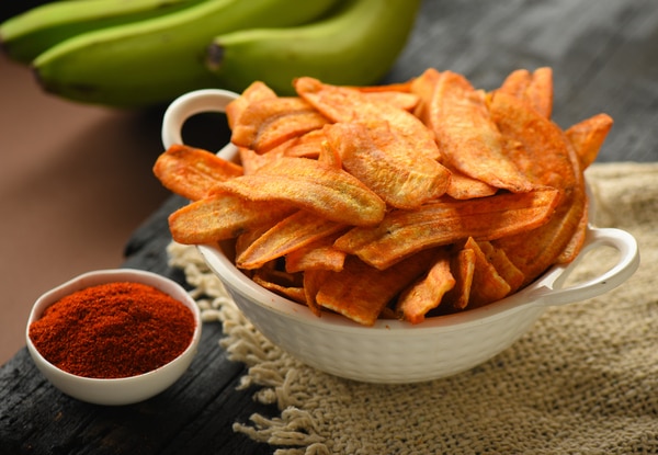 Masala Kela Wafer is an ideal exotic snack that you can eat any time of the day. Its fusion of masalas caters to your craving and taste buds. It is made up of raw banana, refined edible oil, salt, chilly powder and few other spices. They are crunchy and tasty with the essence of dried banana.