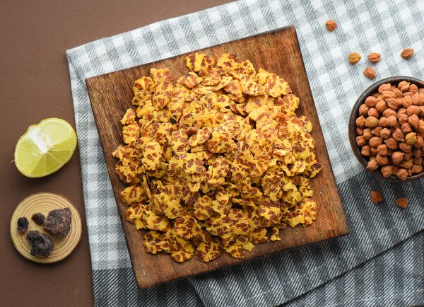 Roasted Chana chor is a mixture of chana flakes with exotic spices like mango powder, red chilly, black pepper, salt and few other flavours. Along with this it is a really ideal snack as it improves digestion and helps in controlling appetite. So you must try this crispy and tangy snack.