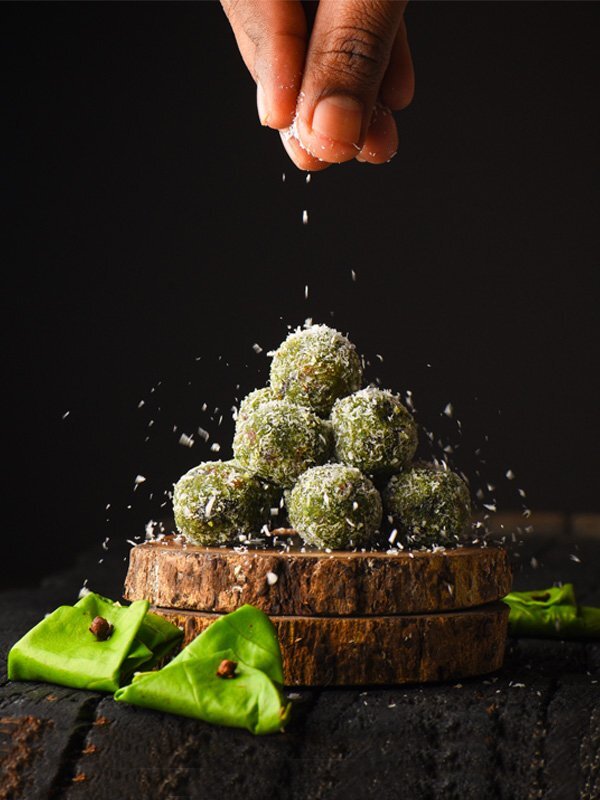 A delectable list of ingredients has been brought together to create this sweet ball of pure indulgence, the Green Paan Ball by FoodSpot. The classic combination of sugar and coconut cooked in ghee has been improved by adding the delicious and refreshing flavours of paan. This sweet ball is ideal to complete any meal or is enough to be enjoyed on its own. The lovely texture of paan and coconut is complemented by the sweetness that comes from condensed milk with an aroma of ghee. A 100 gm serving contains 14 gm of carbohydrates and only 5 gm of fat along with other vitamins and minerals. Benefits:Betel leaves are full of vitamins like vitamin C, thiamine, niacin, riboflavin and carotene and are a great source of calcium.Betel leaves are a powerhouse of antioxidants which them to cure upset stomachs and improve digestion.