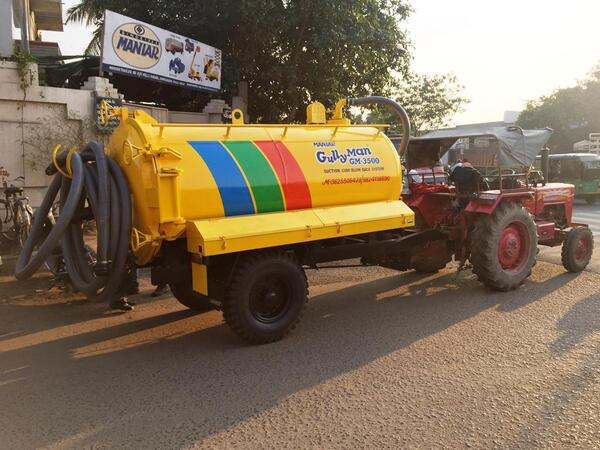 MANIAR ‘GullyMan’ is an advanced technology with a blow-back system for cleaning cesspit, cesspool and manhole chambers. This Machine is capable of creating a very high degree of air pressure which breaks the silt sedimentation that gets accumulated at the bottom of the cesspit, cesspool and manhole chambers. It is equipped with major IMPORTED components including its unique heavy duty Vacuum Pump. It is capable of sucking particles up to 40 to 50mm dia along with sludge from a distance of 100 feet and depth up to 25 feet. The tank can be tilted (optional) at a specified angle and the hinged type rear door can be opened and closed hydraulically to drain out the collected liquid waste or silt. Utmost care has been taken to install adequate safety devices such as Auto shut-off valves, Imported Siphon filter, Safety pressure release valve, Quick release coupling are few safety features among those safety instruments, which ensure that the equipment operates with safety & avoid chances of occurrences of an accident. Tractor-drawn Trailer.Tyre: 7.50 X 16Axle: 65 X 65 mm sq. barBrakes: Internal expanding shoe brake acting on both wheels.Sludge Tank Capacity: 3500Tank Mounting: Tank is mounted in a slope so that the sludge can be discharges by gravity or by pressurized discharge.Material: Mild Steel of 5 mm thicknessSuction Pump: Imported Italian makeCapacity: 216 m3/hrPower for Vacuum Pump: PTO of the Tractor.Suction Hose dia: 3
