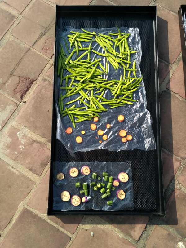 1.75 ft X 3ft SS 304 fabricated sheet Metal structure with blackpowder coating food grade and 2 nos ALLUMINIUMPERFORATED/ tray. Size 16” x 32” with food grade blackcoated as shown in pic. Capacity per tray 3 to 4 kg, .. 1 nos offan (3”) and solar panel ( 5 WATT) for moisture removal, TopCover UV filter Poly Carbonate solid Sheet Unbreakable and 4nos castor wheel for easy movement . Proper dust proof insectproof and waterproof construction for hygiene drying of alltypes of farm produce , Control circuit for fan regulation