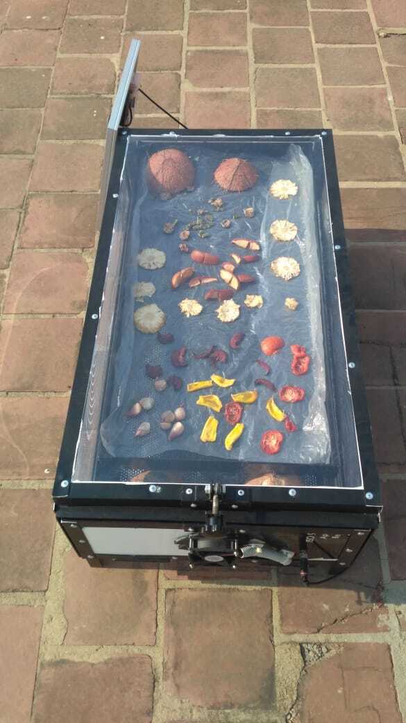 1.75 ft X 3ft SS 304 fabricated sheet Metal structure with blackpowder coating food grade and 2 nos ALLUMINIUMPERFORATED/ tray. Size 16” x 32” with food grade blackcoated as shown in pic. Capacity per tray 3 to 4 kg, .. 1 nos offan (3”) and solar panel ( 5 WATT) for moisture removal, TopCover UV filter Poly Carbonate solid Sheet Unbreakable and 4nos castor wheel for easy movement . Proper dust proof insectproof and waterproof construction for hygiene drying of alltypes of farm produce , Control circuit for fan regulation .
