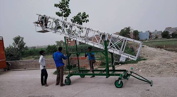 aluminium tiltable Tower ladder with rotational platform 45 degree and 60 degree inclined position work easily available for size any requirement for 60 Feet maximum height providing you.
