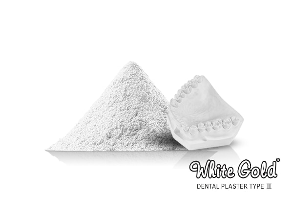 WHITE GOLD is a Type II dental Plaster formulated to be used as a general purpose modeling plaster suitable for making  study models, ortho models , as also for  articulating and flasking procedures. Carefully handpicked mineral gypsum lumps are crushed and calcined under controlled conditions to produce this high grade model plaster which is easy mixing, it gives a smooth and creamy consistency on mixing with gauging water. It exhibits excellent working characteristics, perfect setting time and expansion characteristics. Rapid strength gain and optimum working time makes it much appreciated amongst the dental professionals.

SPECIFICATIONS
__________________________________________________
Colour                                   :   White
Water / Plaster Ratio         :   60 ml / 100 gms
Soaking Time                      :   15 Sec.
Working Time                     :   3 Min.
Initial Setting Time            :   4 - 5 Min.
Final Setting Time             :   8 - 10 Min.
Setting Expansion             :   0 .10 %
Comp. Strength (Dry)       :   90 Kg / cm2
__________________________________________________
Packing - 1 kg., 3 kg., 25 kg HDPE Bag
