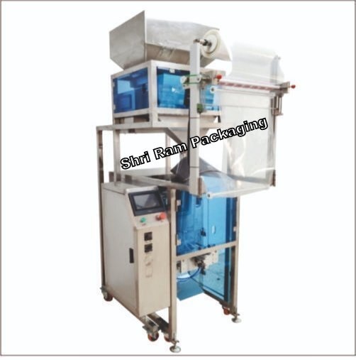 HIGH SPEED AUTOMATIC POUCH PACKAGING MACHINE DOUBLE HEAD or DOUBLE HEAD POUCH PACKING MACHINE 10g- 1Kg for granules automatic weighing filling sealing and automatic batch coding machine