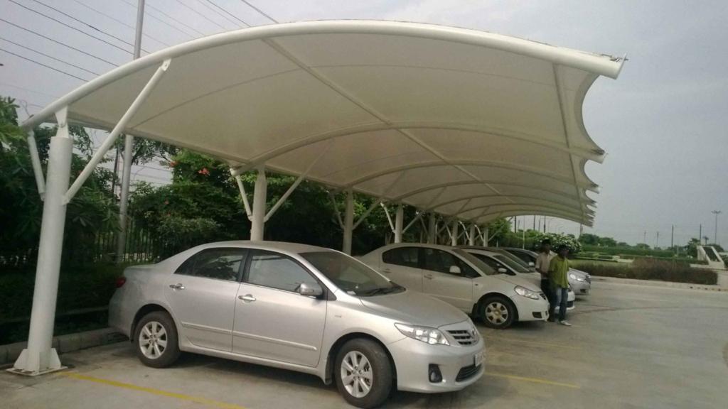The car parking tensile structure covers the complete area and provides protection from harsh sunlight that damages the vehicle . They are designed mostly to protect the vehicles in the parking . The shades are built sturdily using tensile fabric and can endure unfavorable climate conditions