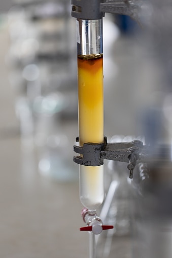 Column chromatography is one of the most important methods of separating (and purifying) solids and liquids. It is most often used on a small-scale (a few grams or mL of material), as the amount of chemical waste and time spent eluting the column increase as the amount of material increases.