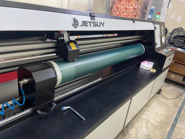 Piezo Rotary Inkjet Screen Exposing MachineSalient Features * Minimization of joint problems since the whole screen is exposed at one instance. * The quality of designs exposed are far superior to the film based exposing. * Reduction in step for screen preparation means faster output. * Cost reduction up to 30% is possible due to the minimization of screen rejection. * Faster preparation of repeat designs as no time is needed to locate the achieve films. * Minimization or elimination of registration issues. Piezo Technology The SMRPR-72 offers the latest Epson DX5 Micro Piezo print head technology. The double row of print head with 1440 nozzles print screen in black ink of 1440 dpi, and engraver using black ink, the SMRPF-72 Series is capable of printing in ultra-fine variable dots frem 1 picoliter to 21 picoliter, making this flatbed one of the highest inkjet engraver on the market today. How to Work This technology use Piezo crystal. A Crystal is located at the black of the ink reservoir of each nozzle. This Crystal receives a tiny electric charge that causes it to vibrate. When it vibrate out, it pulls some ink into the reservoir to replace the ink sprayed out. 