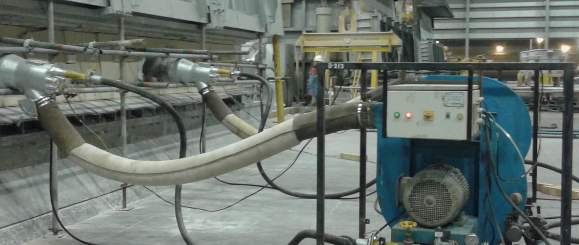 It is very much important that proper dryout of refractories should be undertaken as water is the common solvent for mixing of motars, rams,castables , cements used for installation. This water which is hydraulicaly bonded through chemical interactions, between various refractories after installation needs to be driven out from the lining or else can cause a severe crack by trapping steam in the lining which shall ultimately give way to the entire castable lining. To ensure optimum refractory performance it is imperative that all moisture is removed thoroughly and uniformly during the course of heat-up and prior to the plant being subjected to onstream production.General description of the procedure of the dry-out of a refractory lining : For the dry-out of a refractory lining external High velocity burners are used. These external burners are fired with light weight oil/Gas and will be installed in openings like manholes or doorsburner unit exists of the mobile burner with the Extended Nozzle, the Combustion fan, regulation flap for the combustion air, the connecting air duct and the regulation unit. The fans are sucking the ambient air and compress it up to max. 60 mbar. This air used for combustion of the burner. The burner itself consists of the combustion chamber in which the fuel oil and compressed air/Gas will be mixed with the combustion air and ignited and the steel part (extended nozzle, manufactured of heat resistant steel) which will lead the flue gases. These extended nozzle could be straight or with an angle and the end so that the flue gas could be led to a desired direction and critical parts close to the burner will not be “touched” directly by the flue gases. The air duct is used for the compressed ambient air to the burner.