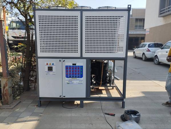 60 TR AIR-COOLED INDUSTRIAL WATER60 TR Pharmaceutical Water Chiller in Air Cooled & Water Cooled.Specifications:-1. Emerson Scroll Type Compressor 20 TR 3 Circuits of Compressor (20 TR X 3)2. Kirloskar Make Water Circulation Pump CENTRIFUGAL MONOBLOCK TYPE3. Siemens Switch Gear Panel4. Shell & Tube Type Heat Exchanger5. MS powder Coated Body6. 12 Months Warranty7. Hi-Cool make Axial Fan