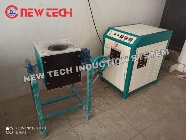 Induction Silver Melting Furnace is based on the latest and most advanced IGBT induction technology.Induction Silver Melting Furnace/Machine is extensively used in Jewellery workshop, Silver casting, Refinery, Bullion, chain making, Bangle making, Lab and Research Institute. Technical Details : Input Voltage - 415 VAC Power Supply - Three Phase Melting Material - SilverBrand - NEW TECH Technology - IGBTMax Temperature - 1150 Degree Melting Time - 30 min * Frequency - 50 HZ / 60 HZ Absorbed Power - 15 Kw Capacity of Crucible - 20 Kg Temperature Measurement - K type Cooling Water Temperature - 20 to 30 degree Water Pressure - 3 Bar Maximum Water Flow - 20 Lit/ Min Weight ( with chilling unit ) - 220 Kg Manufacturer - NEW TECH INDUCTION COMPANY