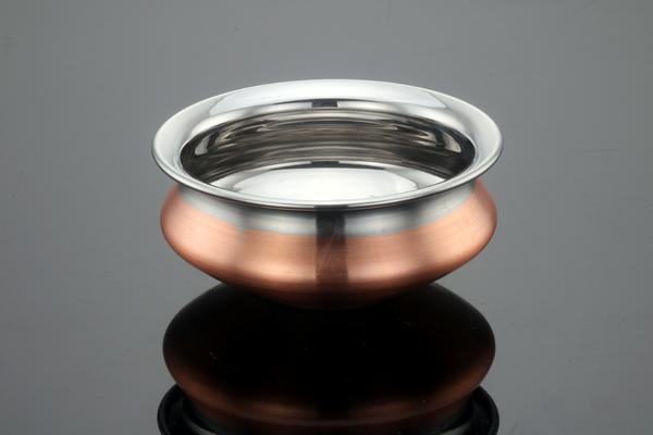 A steel hotel handi is a type of cookware that is commonly used in Indian restaurants and hotels to prepare and serve dishes such as biryanis, curries, and stews. It is a deep, round pot with a wide base and a narrow mouth, which helps to trap heat and moisture and cook the food evenly.The handi is typically made of stainless steel, which is durable and easy to clean. It also has two sturdy handles on either side, which make it easy to lift and carry.One of the key advantages of using a steel hotel handi is that it is versatile and can be used for a variety of cooking tasks. It can be used on gas stoves, electric stoves, and even in the oven.The handi is also ideal for serving food, as it has an attractive, traditional design that is sure to impress guests. It can be used to serve food directly from the stove or oven, or to keep food warm on a buffet table.Overall, a steel hotel handi is a useful and versatile piece of cookware that is well-suited for both cooking and serving food. It is durable, easy to use, and has an attractive design that is sure to impress guests.