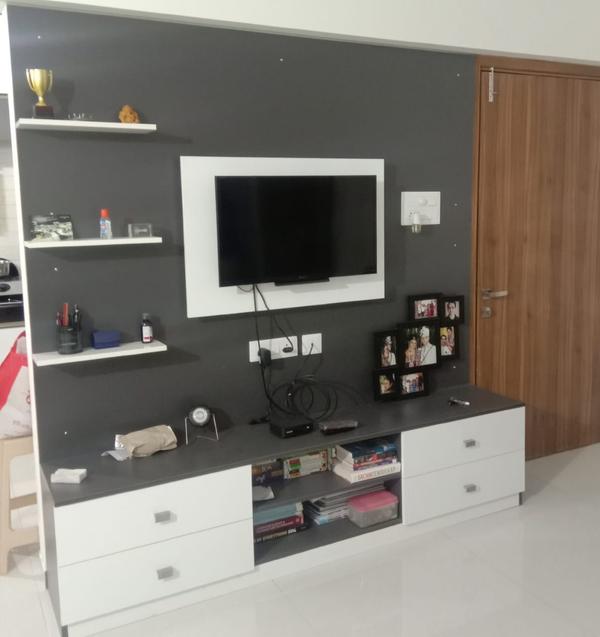 Being a growing and densely populated city, you would easily get modern TV units in Baner, Pune. However, if you wanted to make your shopping experience comfortable, you can buy TV online as well.
Kitchen Studio - Baner is a manufacturer of modular furniture who also provides TV wall units in Pune. You can certainly check for these television units so that you can enjoy the experience of watching television with family.
Later, many changes took place and gradually television screens were evolving in the form of plasma, LCD and LED television among others for better viewing which also paved the way for modular TV units. We Kitchen Studio - Baner provides you best quality TV Unit in Baner, Pune.
