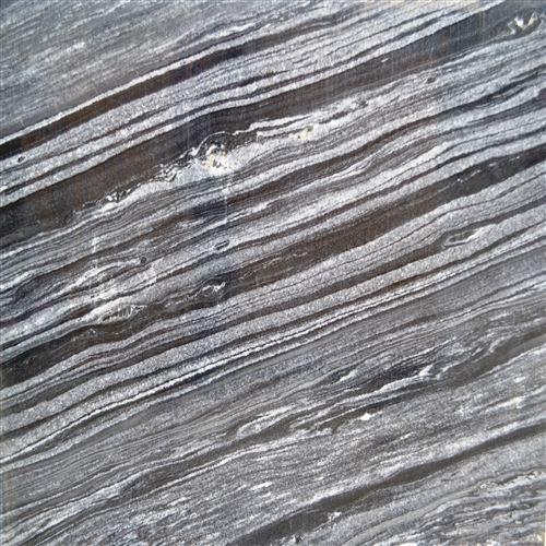 Aqua Black Marble, which has a flash of high brilliance and a crystal-like look, can give your house a dreamy feel. Compared to their Indian cousins, they are significantly more porous and delicate. Most often, people utilise it as a decorative element in the crannies and corners of the house. Typically, they stay away from using it on kitchen countertops since it is more likely to stain.Product Aqua Black MarbleSlab Sizes 10*6 ft., 6*4 ft., 5*4 ft., 7*5 ft. and Full-Size Slabs AvailableThickness 16mm, 18mm & 20mm AvailableFinishes Unpolished & PolishedApplications Counter/Vanity Top, Flooring, Cladding, Marble Handicrafts, Swimming Pool Areas, Bathroom Walls & Floors, Fireplace Walls, External & Internal Aids in Construction