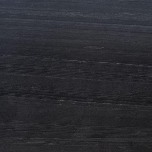 Beautiful Indian natural stone called Carbon Black Marble has a sophisticated, uniform dark grey tint. This stone stuns the room with a seductive colour diversity thanks to its deep black background and wavy white and grey veins on top. This Brazilian quartzite is very hard and exhibits remarkable resistant qualities. Its exquisite features boost the contemporary concept and make it suitable for usage both indoors and outside.