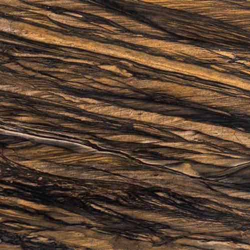 Fantasy Gold Granite is a kind of brown granite quarried in Brazil. Its golden colour with black veining makes it the picture-perfect stone for kitchen countertops, bathroom vanity tops, fireplace settings, and flooring. We are a prominent name, which is engaged in offering Fantasy Gold Granite. The offered range is acclaimed among the clients for its features such as high tensile strength, high compression ratio, good uniformity and durability.