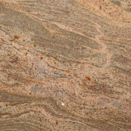 Juparana Columbo Granite is an ochre-yellow, yellowish-brown or pink-yellow migmatite of the Precambrian period. This stone internationally may be nominated as a granite but in the area of application of the European Standard, this stone must be nominated as a migmatite. It’s a durable granite recommended for kitchen counters or bathroom countertops. Over the past few decades, granite has been the material of choice for residential homes as it is able to offer the true beauty of natural stone with its unique and often exotic looks, along with durability, strength and longevity.