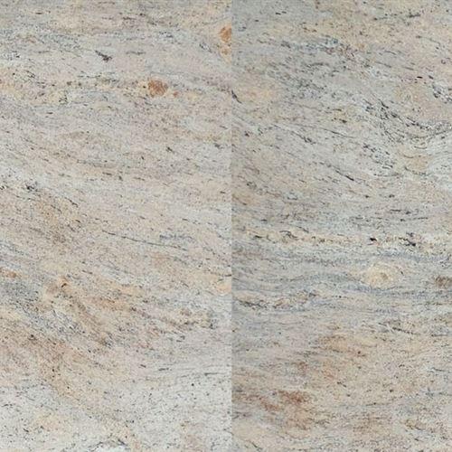 Kashmir Cream Granite from India is a Cream, grey, Red coloured slab with a polished, leathered or honed finish. Kashmir Cream has a linear, gentle flowing movement of golden brown on cream and wheat-coloured background with slight garnet fleck and uniform quartz deposits throughout. It can be paired with a wide range of cabinet colours from white to dark.