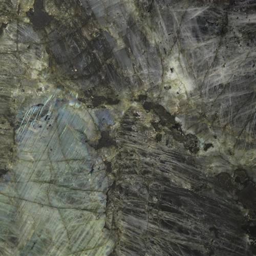 Rich hues of blue, green, black, and turquoise are seen in Lemurian Granite. Lemurian is a granite that was mined in Madagascar and is abundant in deposits of labradorite. A mineral called labradorite exhibits beautiful colours created by interior light-reflecting fissures. This stone is perfect for wall applications or counters in the kitchen and bathroom.