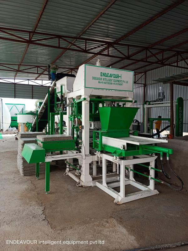 Hydraulic Vibro Compacting Concrete Blocks PlantMulti Product Machine to Produce Fly Ash Bricks, Cement Bricks, Concrete Solid Blocks, Concrete Hollow Blocks, Concrete Paver Blocks, Concrete Paver Blocks with Color Face etc…Model: ENDEAVOUR-iC2500Production Capacity: 12 Bricks per Stroke / 1700-2500 Bricks per HourStandard Bricks Size: 230 X 110 X 75 mm (Size Options Available)Vibration: Oil Filled Box Type High Speed Vibration Controlled by VFDPan Mixer Capacity: 600 Kgs per BatchHydraulic Tank Capacity: 250 LtrsControl Panel: User Friendly PLC Based Control Panel with Touch Screen DisplayPallet Size: 570 X 830 X 25 mmConnected Power: 53.5 HP / 40.125 KW / 3 Phase / 440 Volts / 50 HtzDetails & Specifications are subjected to change without Prior Notice.Automatic Fly Ash Bricks & Concrete Blocks making Equipments are available in wide range of Production Capacity & Prices.