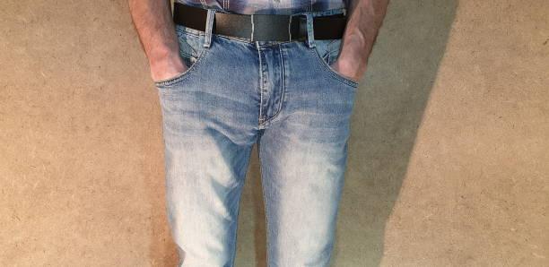 he thigh and calf, while still providing some room for movement. They are a modern and stylish alternative to traditional straight-leg jeans.Slim fit jeans are available in a range of washes, from light to dark, and in different colors. They are typically made from a blend of cotton and elastane, which provides stretch and flexibility for added comfort.When shopping for men's slim fit jeans, it's important to consider the fit and length. The jeans should fit snugly around the waist and hips without feeling too tight, and the length should be appropriate for your height.Slim fit jeans can be dressed up or down depending on the occasion. For a casual look, pair them with a t-shirt and sneakers. For a dressier look, pair them with a button-down shirt and dress shoes.