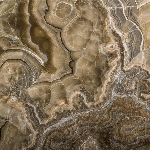 Product	        Smoky Caramel OnyxSlab Sizes	CUTTER SLABS, GANGSAW SLABSCut Sizes	30 cm X 30 cm, 30 cm X 60 cm, 60 cm X 60 cm, 60 cm X 120 cm & Customized Sizes also AvailableThickness	20 mm, 30 mm, 40 mm, 50 mm, 60 mm, 70 mm AvailableFinishes	Leather, Flamed, Brushed, Polished, Honed, LapaturaApplications	Counter/Vanity Top, Flooring, Cladding, Marble Handicrafts, Swimming Pool Areas, Bathroom Walls & Floors, Fireplace Walls, External & Internal Aids In Construction