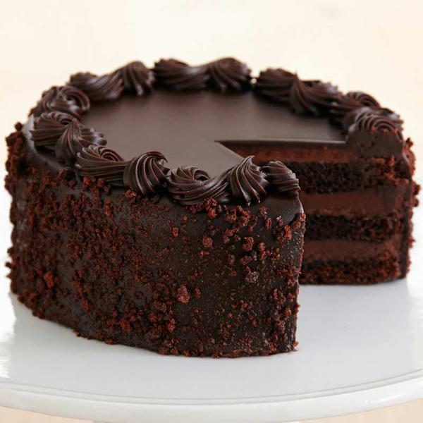 Rich dark belgian chocolate cake layered with moist chocolate sponge