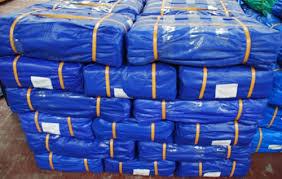HDPE tarpaulins are made from premium quality woven HDPE fabric laminated with LDPE on both sides. There are various qualities and thicknesses available which are made using multiple layers of HDPE sandwiched between layers of LDPE on the outside. These types of tarpaulins are very rugged and are most suited for applications where there is a great deal of wear and tear.Colors AvailableGreenOrangeBlueFeaturesAll products are made from virgin polyethyleneHigh tensile strength and puncture resistanceLight weight hence ease of handlingOutstanding flexibility hence suited to cover irregular shapesTough and durableHeat sealed hemmings with strong joints; no stitchesProtective UV stabilized on both sides and hence lasts longer even in sunny outdoorsFire retardantResistant to Stains Acids, Dyes and most Chemicals100% waterproof, leak proof, weatherproof, oil proof and rot proofEasily repairable and cost-effectiveStrong aluminum passivity eyelets – hook fixed100% recyclable; environment-friendly