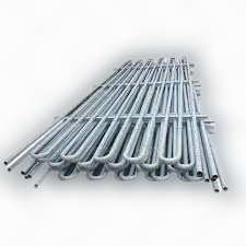 Standard Atmospheric Ammonia condensers are made from 50mm NB(2″) heavy class ERW Pipes and heavy duty “U” Bends. The size is 12 pipes high x 6 meter (20′) long. Condensers are supplied with gas and liquid headers and water sprinkler pipes, water sprinklers are made of Medium class GI, ERW pipes of 50mm NB (2″). The condensers are supplied with Red oxide primer coating.Optional FeaturesCondensers with seamless pipes.