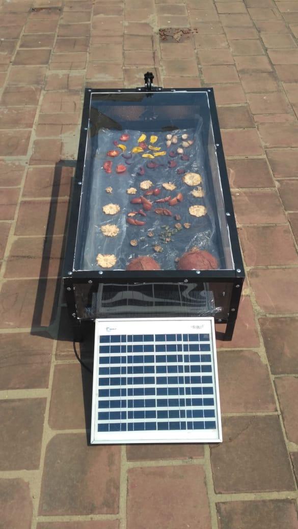 1.75 ft X 3ft SS 304 fabricated sheet Metal structure with black powder coating foodgrade and 2 nos ALLUMINIUM PERFORATED/ tray. Size 16” x 32” with food gradeblack coated as shown in pic. Capacity per tray 3 to 4 kg, .. 1 nos of fan (3”) and solarpanel ( 5 WATT) for moisture removal, Top Cover UV filter Poly Carbonate solid SheetUnbreakable and 4 nos castor wheel for easy movement . Proper dust proof insect proofand waterproof construction for hygiene drying of all types of farm produce , Control circuitfor fan regulation .