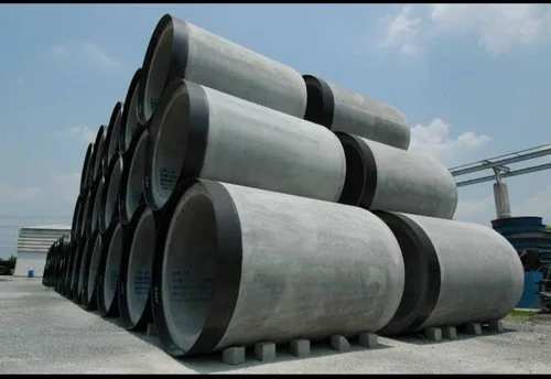 RCC (Reinforced Concrete Cement) jacking pipes are a type of pipe used in underground infrastructure projects, particularly in sewer systems or pipeline installations. They are designed to be installed using a jacking method, which involves pushing or jacking the pipe into a pre-excavated tunnel or borehole.RCC jacking pipes are made of high-strength reinforced concrete, which provides structural integrity and durability. The pipes are manufactured in segments with tongue-and-groove joints or special rubber gaskets that allow for a watertight connection between the sections.During installation, the jacking pipes are pushed or jacked into the ground using hydraulic jacks or mechanical systems. This process eliminates the need for extensive excavation, reducing disruptions to the surface and minimizing environmental impact.RCC jacking pipes offer several advantages. They are known for their high load-bearing capacity, making them suitable for installations that require the pipes to withstand heavy loads or ground pressures. The reinforced concrete construction also provides resistance to corrosion, erosion, and abrasion, ensuring the longevity of the pipeline.The tight-fitting joints between the segments create a secure and watertight pipeline, reducing the risk of leakage or infiltration. This is particularly important in sewer systems, where preventing the ingress of groundwater or the escape of wastewater is critical.RCC jacking pipes are available in various diameters and lengths to accommodate different project requirements. They can be designed to withstand specific ground conditions, including soft soils, rock formations, or varying water table levels.Overall, RCC jacking pipes offer a reliable and efficient method for installing underground pipelines. Their strength, durability, and watertight characteristics make them a popular choice in sewer projects and other underground utility systems where the jacking method is applicable.