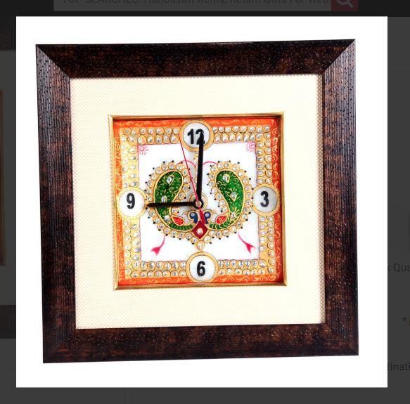 SKU: BH-0070Dimension: 6 X 6 inch approxThe beautiful hand-painted images of a pair of peacocks adorned with dazzling beadwork, make this marble meenakari wall clock truly unique.