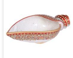This marble crafted serving conch is one that you will use only to impress the guest who visits your home. Right from its handle to its tip, the conch is decorated to bedazzle the onlookers with tits bright red and gold colors, fine artistic work and magnificent bead work. Ideal as return gifts online!
