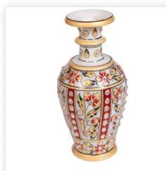 This marble meenakari artwork flower vase is creatively designed by Indian artisans & perfect for any living room or office space.This marble meenakari flower vase is just perfect to adorn your bedside table as with or without flowers it will constantly brighten up your room with its rich artwork and dazzling beadwork. The deliberate use of only two colors adds to the uniqueness and the elegance of this vase quite significantly. Perfect gift for your loved ones!