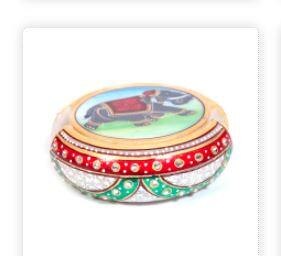 The magnificent marble, beads and meenakari work in red, green, golden and brown hues on the holder further enhance the beauty of this magnificent piece of traditional art and crafts of Indian artisans.The hand-painted image of the elephant on this six-piece marble handicraft tea coaster gives it a strong and robust look. The magnificent beads and minakari work in red, green, golden and brown hues on the holder further enhance the beauty of this magnificent handmade decorative piece of art and creativity of craftsmen. Perfect for retirement gifts India!