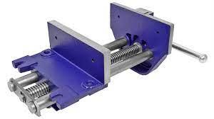 a vise with jaws that are padded in order to hold lumber without denting it. synonyms: shoulder vise, wood vise. type of: bench vise, vise. a holding device attached to a workbench; has two jaws to hold workpiece firmly in place.