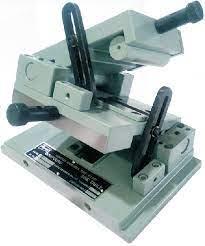 A sine table (or sine plate) is a large and wide sine bar, typically equipped with a mechanism for locking it in place after positioning, which is used to hold workpieces during operations.