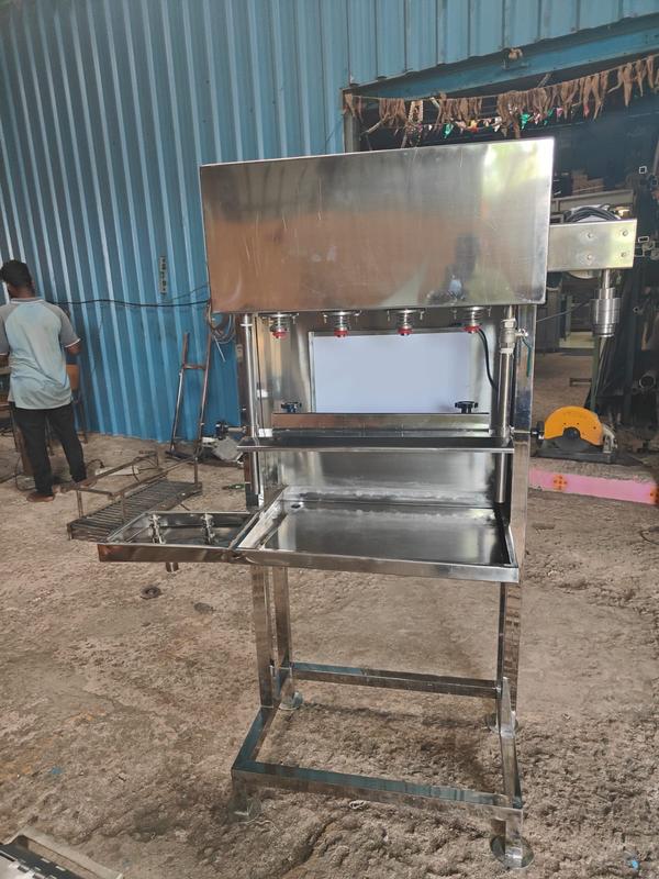 MANUAL BOTTLE FILLING MACHINGE