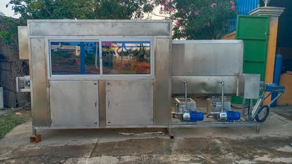 This machine contains four stages. First stage for soap oil washing,second stage for raw water outer washing.Then By can moves to Inner washing of product,hot water washing. This washing per hour 400cans.