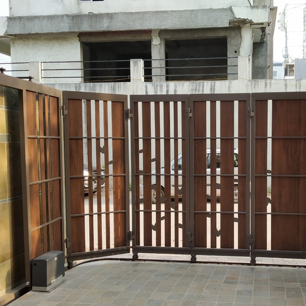 Motorized Sliding Folding Gates are useful where there is restricted and compact space for entrace.  It Slides parallel to compound wall giving complete opening space.The Gate is made using best quality wheels and accessories to ensure smooth functioning of the gate.