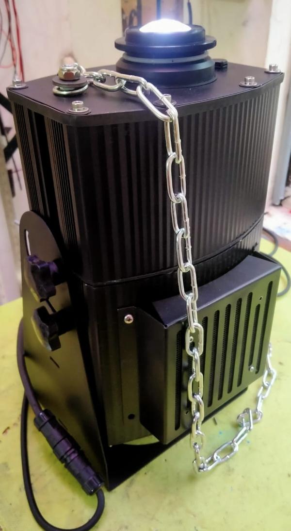 Power:- 300WProduct Specification:- Luminous:-30000lm Voltage:-220V AC Working Temperature:- -40 to 60c Ambient Ip Rating:- IP65 Model No:- HIS-FLWS-020-300W Power Supply:-AC/ (DC 12V Optional) Efficiency:- 90 Total Harmonic Distortion:-<10 CRI:->90 CCT (LED Colour):-5000 K Led chip:- CREE/OSRAM Mounting:- Clamp Driver Surge Protection:-5kv Power Factor:-0.95 No of logo in light:-1 No Luminaire Life time:- 60,000 Hours Certification:- RoHS, CE Working voltage:- AC 85 to 265v Body Material:- Aluminium, Anodised Weight:- 16 kg Height of Crane:- Up to 40 meter Logo(Colour : Blue/Red) Customized as per client requirement Cooling System: Natural Cu fin based Note: Logo Projection Light may be not visible during direct sunlight and High Power floor LED Lighting near to Installation. Please consider for better result. Approx Dimensions