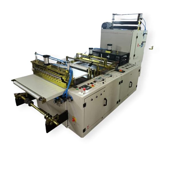 TYPE:Three side seal {with two webs} pouch or Two side seal rolls making machine.USES:Designed to make pouches and rolls of Tyvek (medical Grade) / Paper (Medical Grade) with HM film or a laminate film in roll form and with heat sealing property.Unwind 1:To hold 500 mm width material. (Paper), Min. 50 mm460 mm Dia. Max.76 MM core ID.Powder Brake 5 Nm with controllerUnwind 2:To hold 500 mm width material. (Tyvek), Min. 50 mm460 mm Dia. Max.76 MM core ID.Powder Brake 5 Nm with controllerMAIN FRAME:Fabricated on 75X40mm MS Chanel. Heavy construction made, vibration less to suit 100-p/min pouching speed.PUNCHING UNIT:One ‘D’ Punch unit to punch a hole with movement connected through pneumatic piston for up and down motion. Pressure controlled through pneumatic control. Time controlled through PLC. SIDE SEALER (L) & (R):2 units for left and Right side provided with movement connected through pneumatic piston for up and down motion. Pressure controlled through pneumatic control. Time controlled through PLC.Winding unit:A tension controlled winding unit provided for winding of 2 side sealed rolls. (Not shown in line diagram) 7. Flexo Unit:To print indicator ink mark in continuous printing. CHEVRON SEALER:Chevron shaped sealing die unit with movement connected through pneumatic piston for up and down motion. Pressure controlled through pneumatic control. Time controlled through PLC. Quotation includes only 1 pcs of Die. Extra Die sealer will be Rs. 6000/- per pc, extra.PHOTO CELL:An electronic eye to control the driving servo motor for print or punch registration.CUTTING BLADE:Cutting Blade (22